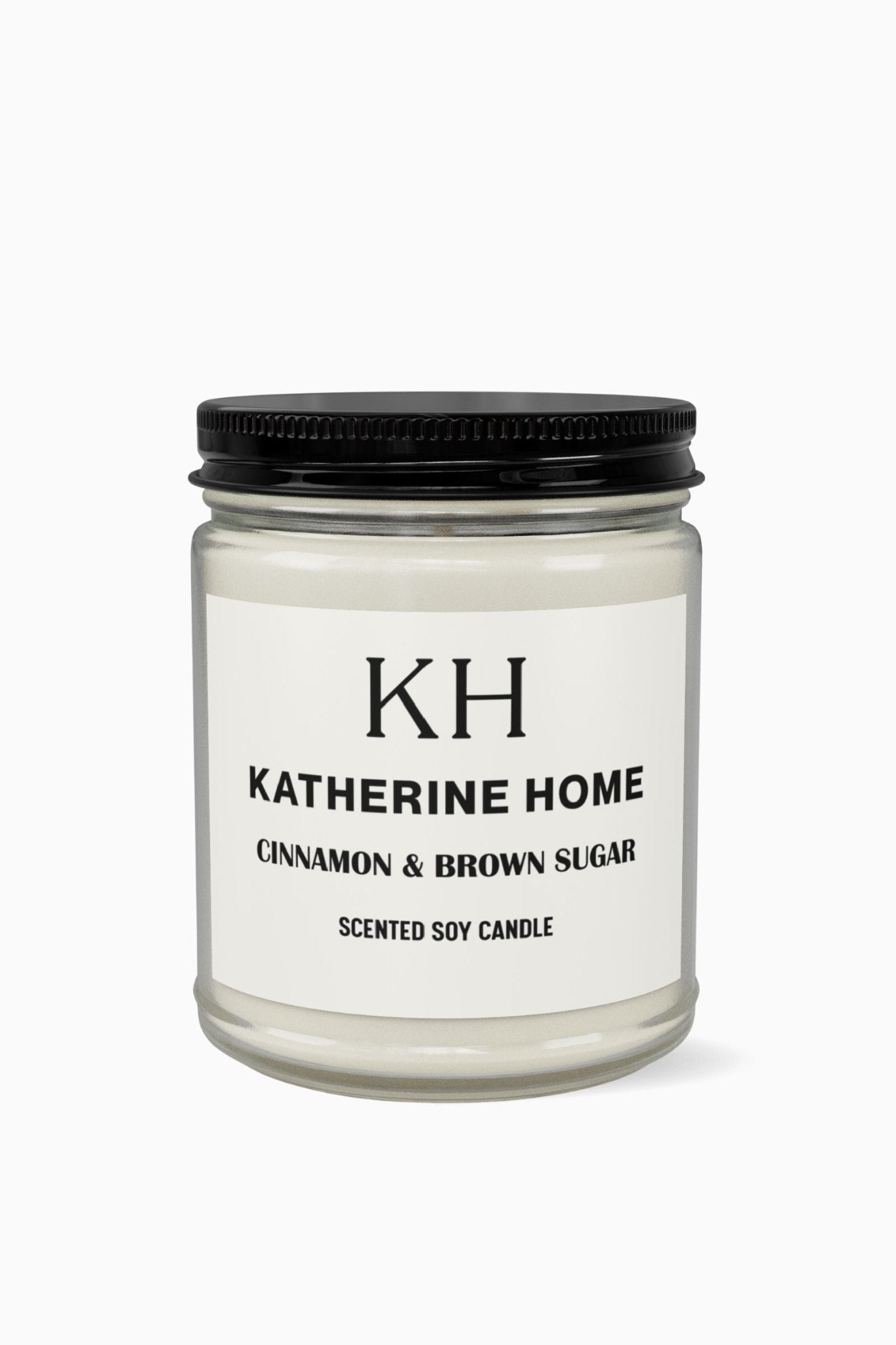 Cinnamon & Brown Sugar - KATHERINE HOMEHome DecorKATHERINE HOMEKATHERINE HOMEKatherine Home Cinnamon & Brown Sugar scented soy candle in a clear glass jar, minimalist product hero image.Amber Jar + Black Lid4oz