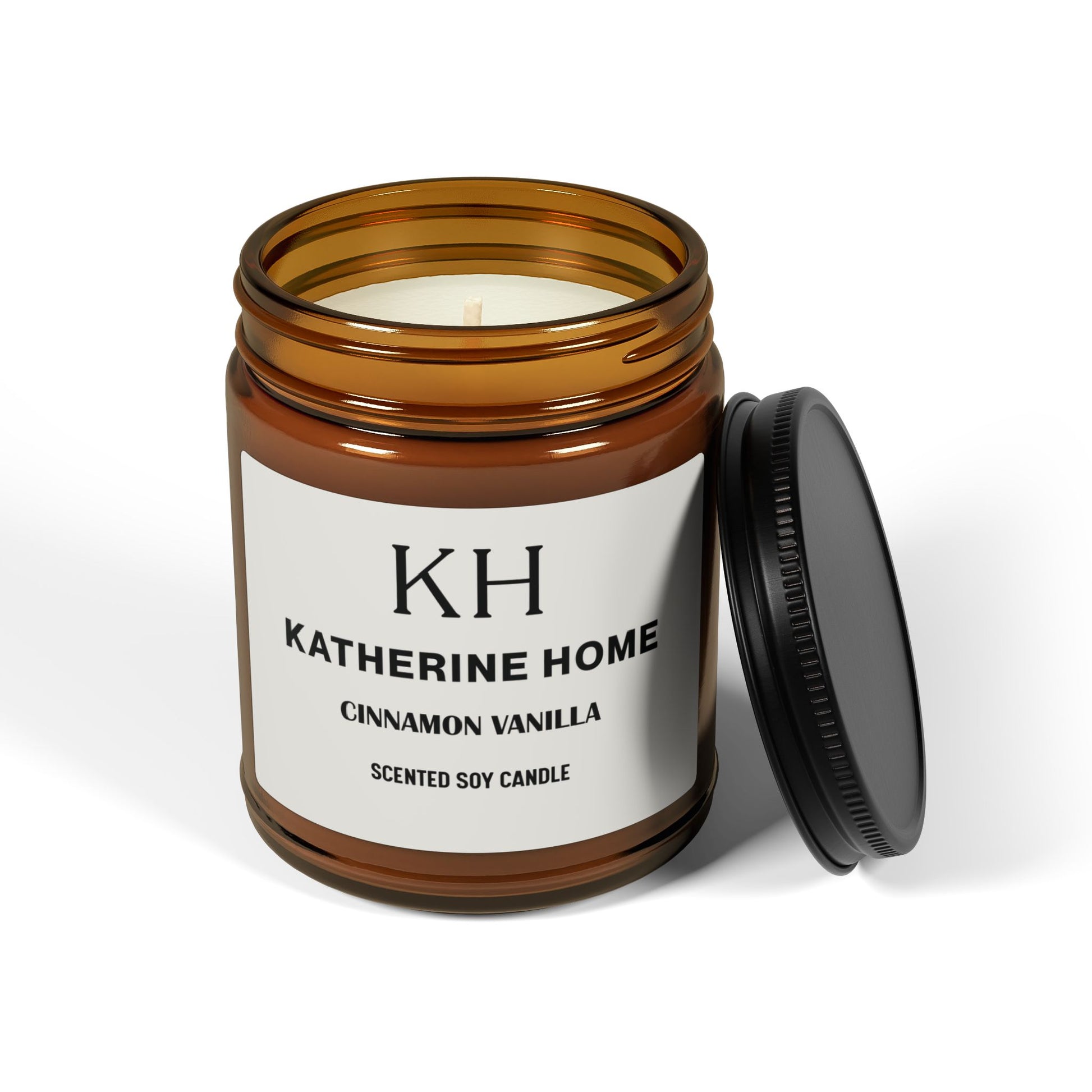 Cinnamon Vanilla Amber Soy Candle in brown glass jar with lid, featuring notes of spicy cinnamon and creamy vanilla for a cozy home atmosphere.