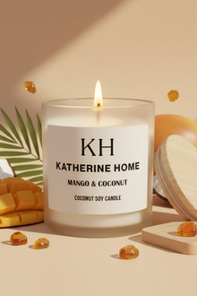 Katherine Home candle with mango and coconut elements on a beige background