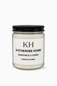 Grapefruit & Citron - KATHERINE HOMEHome DecorKATHERINE HOMEKATHERINE HOMEKatherine Home Grapefruit & Citron scented soy candle in a clear glass jar, minimalist product hero image.Amber Jar + Black Lid4oz