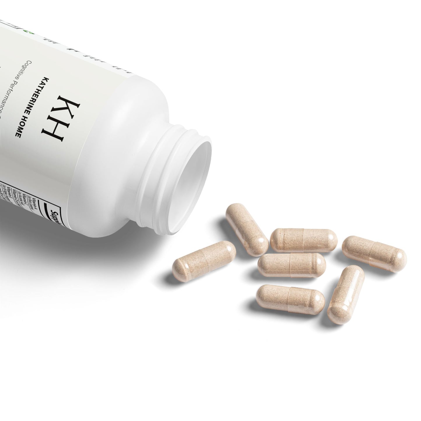 Open bottle of Katherine Home Brain Support Complex with beige capsules spilling onto a clean white background.