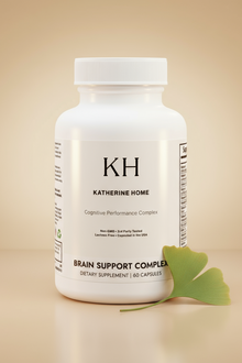 Supplement bottle labeled 'KH Katherine Home' on a beige background with a ginkgo leaf.