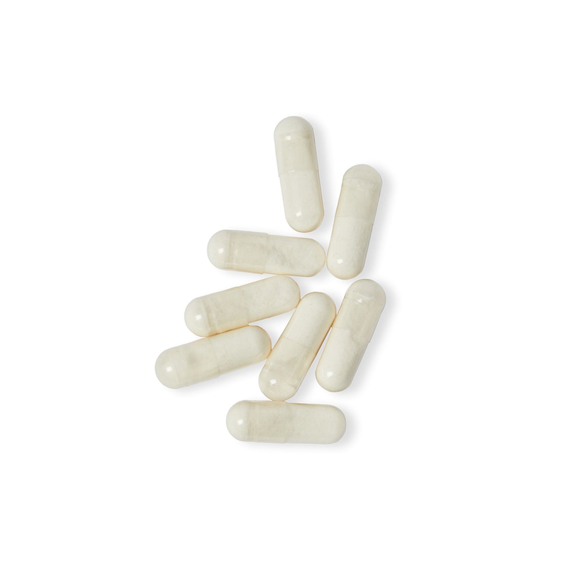 Close-up of Digestive Enzyme Blend capsules displayed on white background.