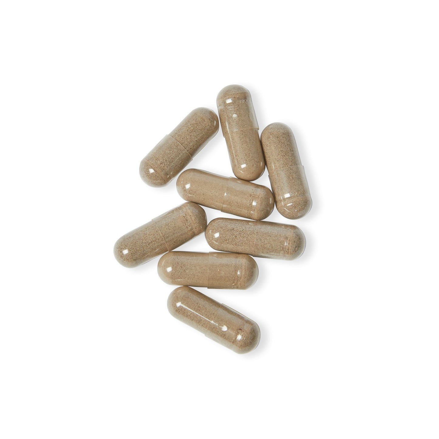 Beige Sea Moss capsules displayed close-up on a white background.