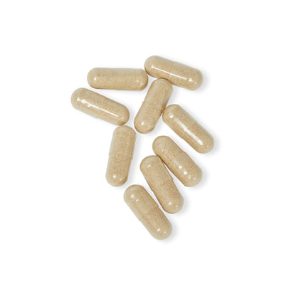 Close-up of KH Katherine Home Sleep Formula capsules displayed on a white background.
