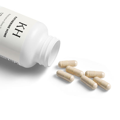 Open KH Katherine Home Sleep Formula bottle with visible beige capsules and minimalist white label.