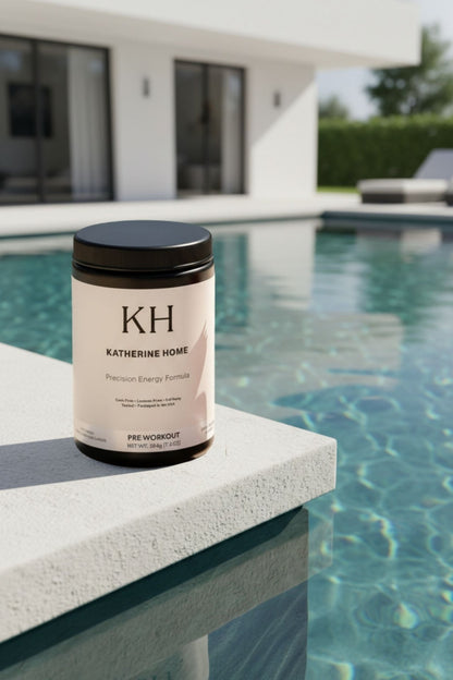 Pre Workout Supplement Fruit Punch - KATHERINE HOMEFood SupplementsKATHERINE HOMEKATHERINE HOMEKatherine Home Pre - Workout Supplement Fruit Punch placed on a pool ledge in a modern luxury outdoor lifestyle setting.