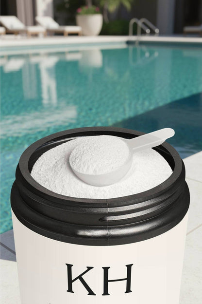 Pre Workout Supplement Fruit Punch - KATHERINE HOMEFood SupplementsKATHERINE HOMEKATHERINE HOMEClose - up of Katherine Home Pre - Workout Supplement Fruit Punch powder with scoop, photographed near a pool in natural daylight.