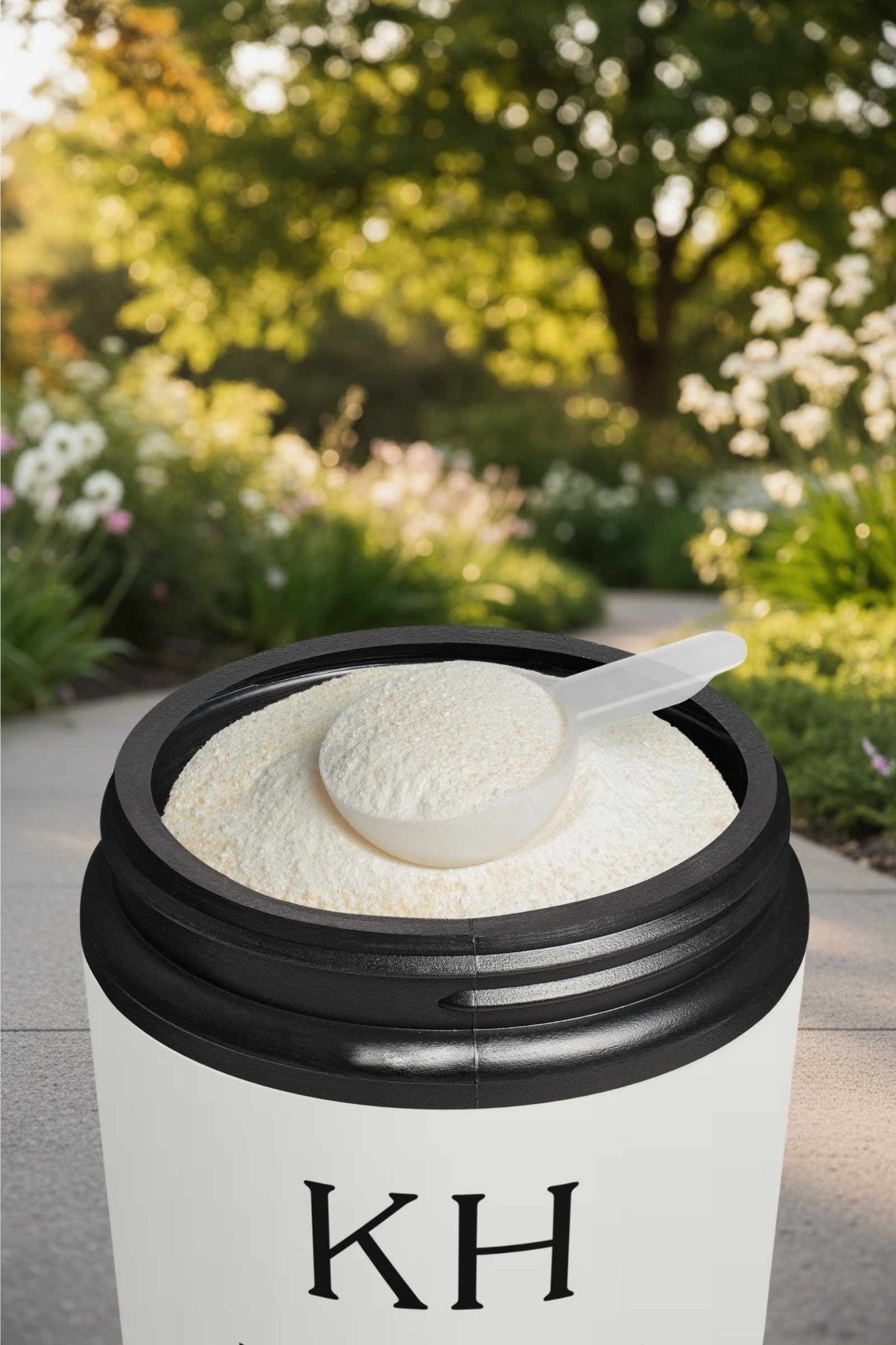 Pre Workout Supplement Watermelon - KATHERINE HOMEFood SupplementsKATHERINE HOMEKATHERINE HOMEOpen Katherine Home pre - workout supplement jar showing fine powder and scoop, photographed outdoors in natural light.